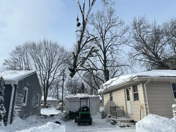 Snow removal service in Green Bay WI clearing driveway after storm